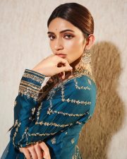 American Born Tollywood Actress Sreeleela in a Teal Blue Traditional Lehenga with Golden Embroidery Photos 02