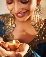 American Born Tollywood Actress Sreeleela in a Teal Blue Traditional Lehenga with Golden Embroidery Photos 06