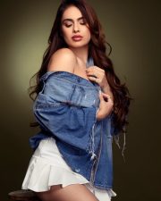 Apni to Party Actress Neha Malik in an Oversized Denim Shirt and White Mini Skirt Photos 02