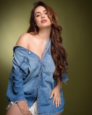 Apni to Party Actress Neha Malik in an Oversized Denim Shirt and White Mini Skirt Photos 07