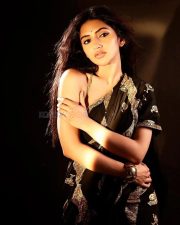 Bold Sreeleela in a Black Saree with Metallic Gold Motifs and Sleeveless Deep Cut Blouse Photos 03 Bold Sreeleela in a Black Saree with Metallic Gold Motifs and Sleeveless Deep Cut Blouse Photos 03