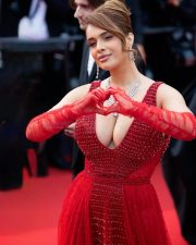 Bold and Busty Neha Malik in a Red Crystal Embellished Scarlet Gown with a Cleavage Revealing Neckline Photos 02