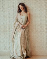 Desirable Telugu Actress Sreeleela in a Sage Green Sleeveless Anarkali Kurta with a Two Tone Chanderi Silk Dupatta Stills 02