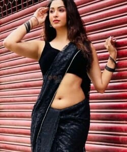 Eshanya Maheshwari Hot Navel in Black Saree Photos 02