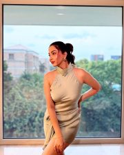 Glam Beauty Eshanya Maheshwari in a Tied Up Satin Halter Neck Short Dress Photos 02