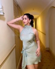 Glam Beauty Eshanya Maheshwari in a Tied Up Satin Halter Neck Short Dress Photos 03