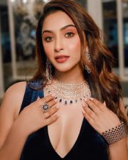 Glam Eshanya Maheshwari Cleavage in a Black Satin Dress Pictures 02