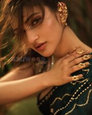 Mesmerizing Actress Sreeleela in a Teal Embroidered Silk Saree Photos 01