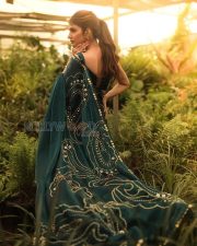Mesmerizing Actress Sreeleela in a Teal Embroidered Silk Saree Photos 05