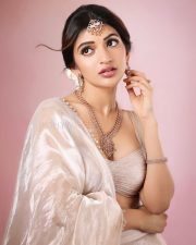 Parasakthi Heroine Sreeleela in a Beige Lehenga with a Spaghetti Strap Crop Top and Flared Skirt Photos 05