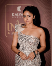 Photogenic Actress Pragya Nayan in a Silver Sequined One Shoulder Gown Photos 03