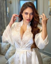 Provocative Neha Malik Cleavage in a White Lace Satin Robe Photos 05
