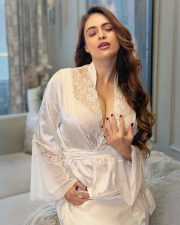 Provocative Neha Malik Cleavage in a White Lace Satin Robe Photos 06