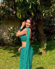 Radiant Actress Eshaanya Maheshwari in a Teal Striped Saree Photos 07 Radiant Actress Eshaanya Maheshwari in a Teal Striped Saree Photos 07