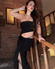 Seductive Beauty Neha Malik in a Bold Black Strapless Cut Out Maxi Dress Photos 05
