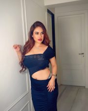 Seductive Beauty Neha Malik in a Bold Black Strapless Cut Out Maxi Dress Photos 09