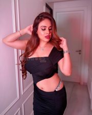 Seductive Beauty Neha Malik in a Bold Black Strapless Cut Out Maxi Dress Photos 10