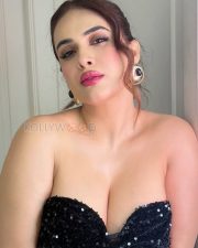 Seductive Neha Malik Cleavage in a Black Strapless Sequin Mini Dress Photos 08