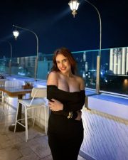 Sexy Neha Malik in a Black Off Shoulder Bodycon Maxi Dress Photos 03