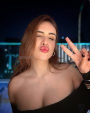 Sexy Neha Malik in a Black Off Shoulder Bodycon Maxi Dress Photos 04