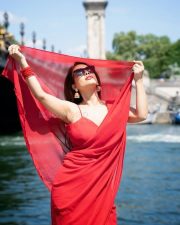 Sexy Neha Malik in a Red Saree with Matching Spaghetti Strap Sleeveless Blouse Pictures 01