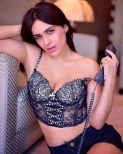 Sexy Neha Malik in a Victoria Secret Black Corset Bra Photos 04