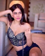 Sexy Neha Malik in a Victoria Secret Black Corset Bra Photos 09