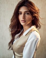 Sexy Sreeleela in a Beige Vest over a White Shirt and Beige Pants Photos 02
