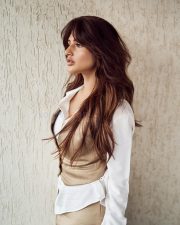 Sexy Sreeleela in a Beige Vest over a White Shirt and Beige Pants Photos 03 Sexy Sreeleela in a Beige Vest over a White Shirt and Beige Pants Photos 03