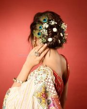 Talented Heroine Sreeleela in an Off White Floral Saree with a Deep Red Low Cut Blouse Photos 02 Talented Heroine Sreeleela in an Off White Floral Saree with a Deep Red Low Cut Blouse Photos 02