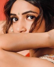 Talented Heroine Sreeleela in an Off White Floral Saree with a Deep Red Low Cut Blouse Photos 03