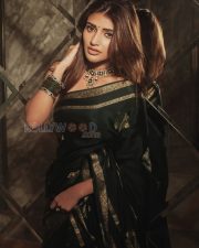 Timeless Actress Sreeleela in a Dark Green Silk Saree Photos 06