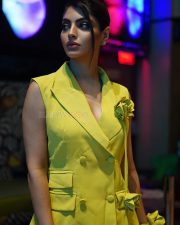 Actress Akanksha Puri in a Sleeveless Yellow Blazer Dress with a Deep V Neckline Pictures 02