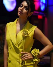 Actress Akanksha Puri in a Sleeveless Yellow Blazer Dress with a Deep V Neckline Pictures 04
