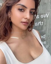 Alluring Anveshi Jain Cleavage in a White Deep Neck Tank Top Photos 02