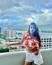 Anushka Sen in White Shorts Posing in the Balcony Photoshoot Pictures 01