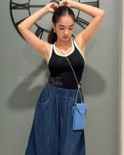Anushka Sen in a Long Blue Denim Skirt and Black Sleeveless Top Picture 01