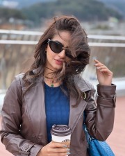 Beautiful Anushka Sen in a Blue Bodycon Dress with a Brown Leather Jacket Photos 02