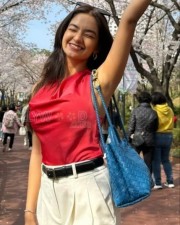 Beautiful Anushka Sen in a Red Halter Top with White Pant Pictures 01