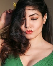 Beautiful Komal Jha in a Green V Neck Dress Photos 01