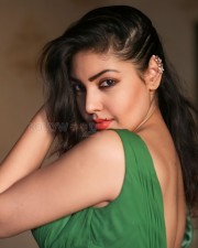 Beautiful Komal Jha in a Green V Neck Dress Photos 02