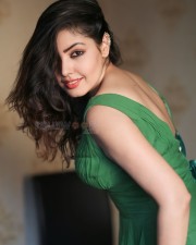 Beautiful Komal Jha in a Green V Neck Dress Photos 04