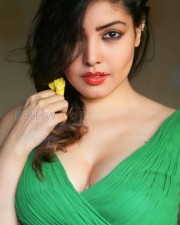Beautiful Komal Jha in a Green V Neck Dress Photos 09