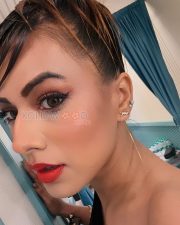 Bold Actress Nia Sharma in a Black One Shoulder Cut Out Top Photos 04