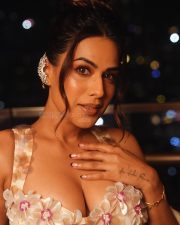 Captivating Nia Sharma in a Bustier Deep Neck Backless Bralette Top and Mermaid Skirt Photos 01