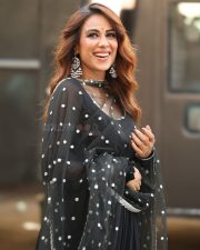 Charismatic Actress Nia Sharma in a Black Polka Dot Sheer Anarkali Suit Photos 01