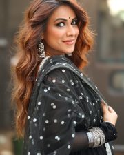 Charismatic Actress Nia Sharma in a Black Polka Dot Sheer Anarkali Suit Photos 04