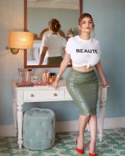 Charming Actress Anveshi Jain in a White Crop Tee And Olive Leather Skirt Photos 01