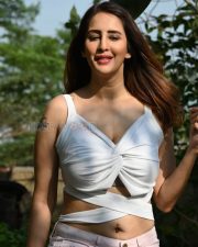 Charming Actress Chahatt Khanna in a White Twisted Crop Top and Pink Shorts Photos 01