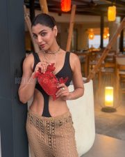 Chic Actress Akanksha Puri in a Black bodysuit with beige crochet skirt Photos 04 Chic Actress Akanksha Puri in a Black bodysuit with beige crochet skirt Photos 04